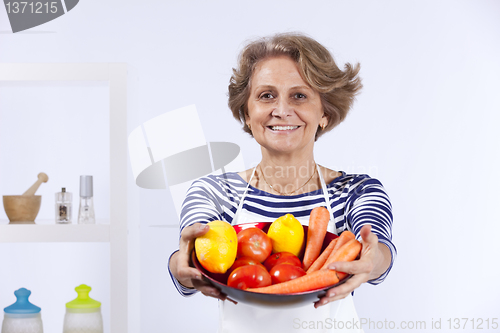 Image of Senior woman cooking