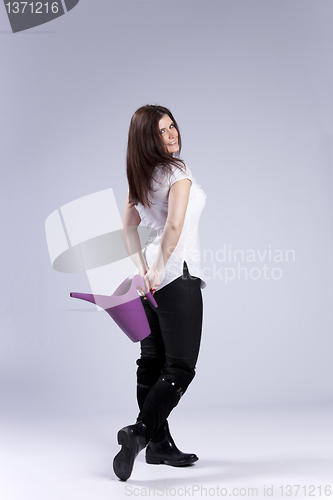 Image of Woman with a watering can