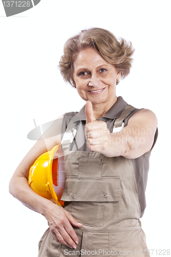 Image of Senior woman with a hardhat