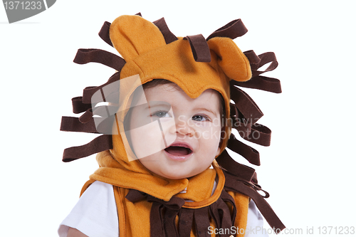 Image of Baby with a lion mask
