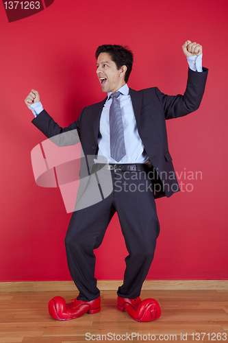 Image of Businessman with clown shoes