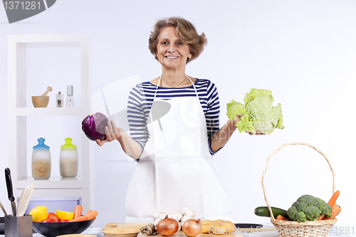 Image of Senior woman cooking