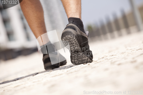 Image of Athlete man shoes walking