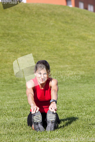 Image of woman doing exercise outdoor
