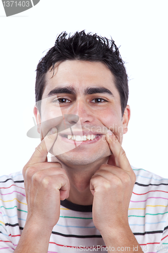 Image of Young man with a funny face