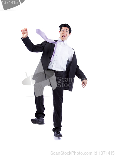 Image of Businessman almost falling