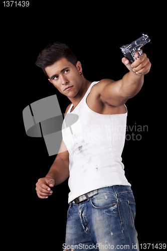 Image of Man aiming a handgun