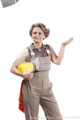 Image of Senior woman with a safety hat