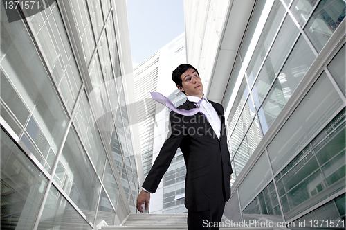Image of Businessman with a flying necktie