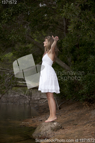 Image of Beauty young woman enjoying nature