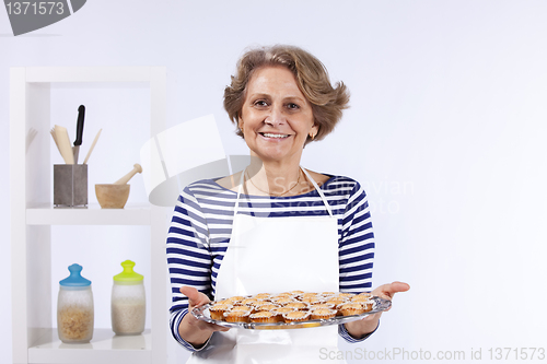 Image of Senior woman cooking