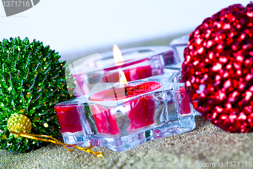 Image of Christmas baubles and candles