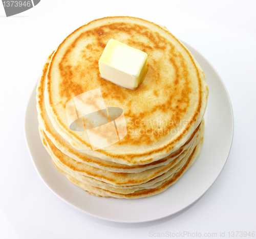 Image of Golden pancakes with butter