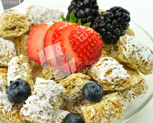 Image of Shredded Wheat Cereal with fruits and berries 