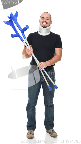 Image of smiling man with crutch