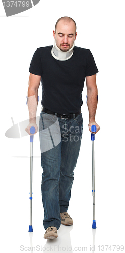 Image of man with crutch