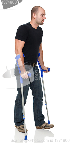 Image of man with crutch