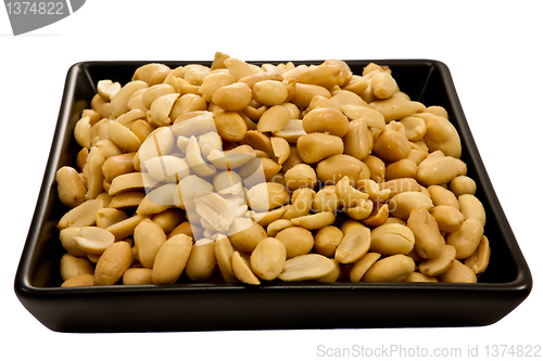 Image of peanuts on black plate