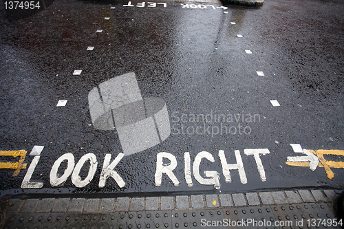 Image of Look Right warning at a pedestrian crossing in a London street