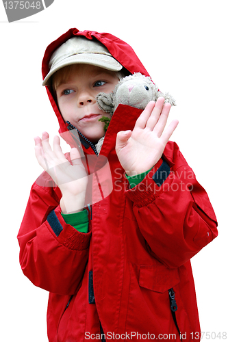 Image of Boy with toy lambkin