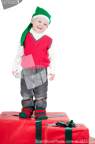 Image of Christmas toddler with presents
