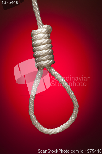 Image of Hangman's Noose Over Red Background