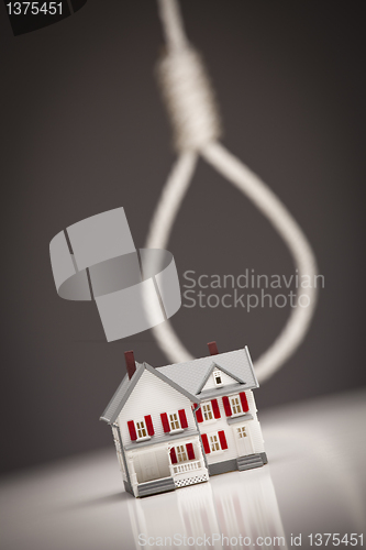 Image of House with Hangman's Noose in Background