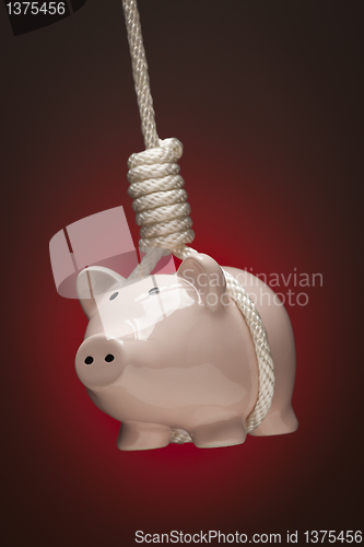 Image of Piggy Bank Hanging in Hangman's Noose on