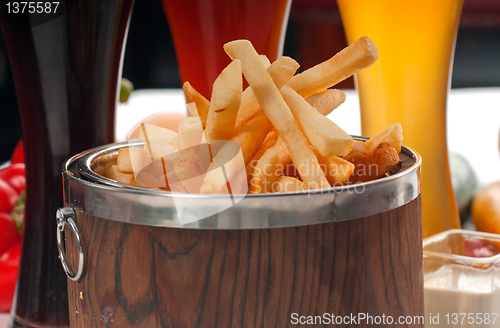 Image of fresh french fries on a bucket