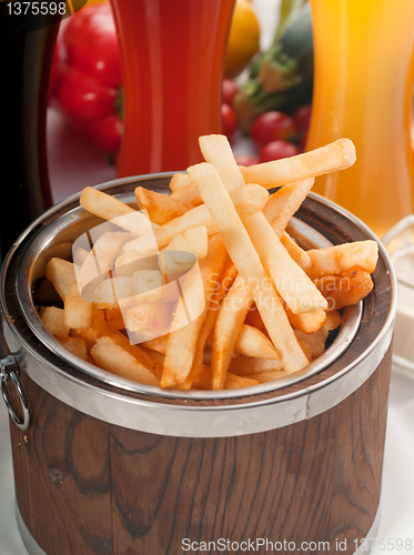 Image of fresh french fries on a bucket