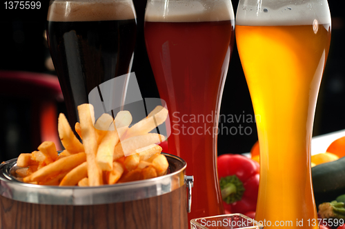 Image of fresh french fries on a bucket