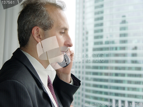 Image of Businessman by the window