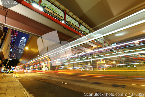 Image of car light trails in modern city
