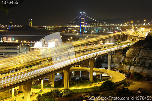 Image of freeway and bridge at night