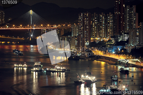 Image of Night shot of a city skyline.