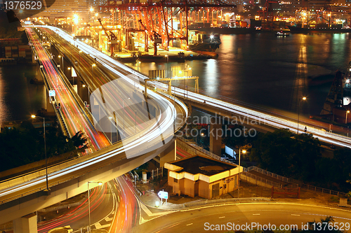 Image of Overpass at night through the port 