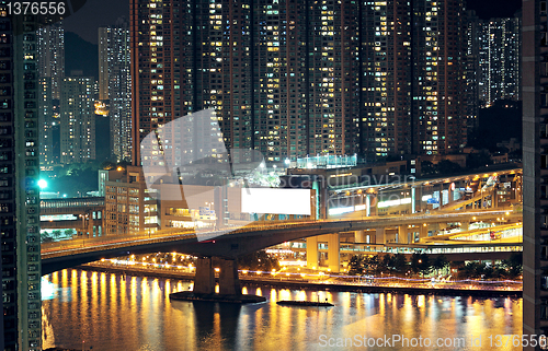Image of Night shot of a city skyline.