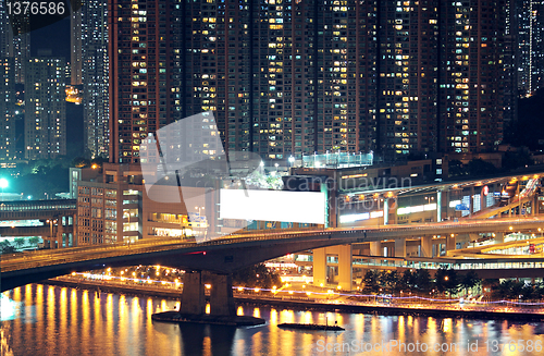 Image of Night shot of a city skyline.