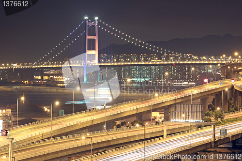 Image of highway and bridge at night