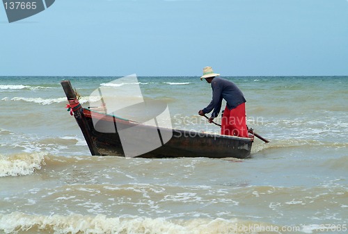 Image of Man and boat