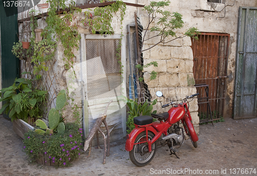 Image of Old red moped