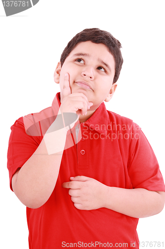 Image of Child with a pensive expression looking up. Isolated on white ba