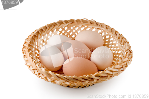 Image of Eggs lay in a woven basket