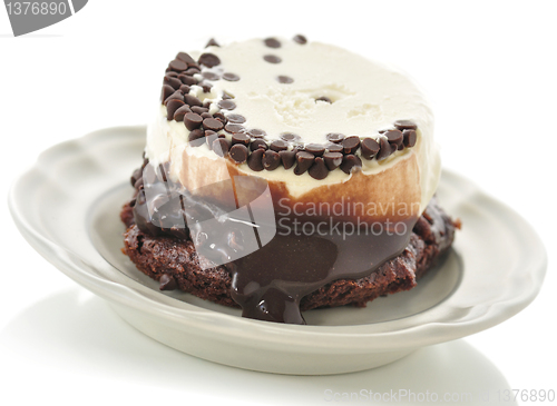 Image of fudge brownie with ice cream 