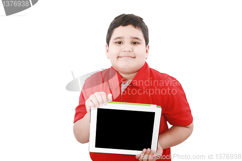 Image of Young boy holding a tablet computer isolated on white 