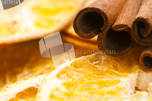 Image of Dried orange and cinnamon sticks - christmas decoration