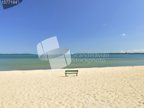 Image of lake Michigan beach with bench 