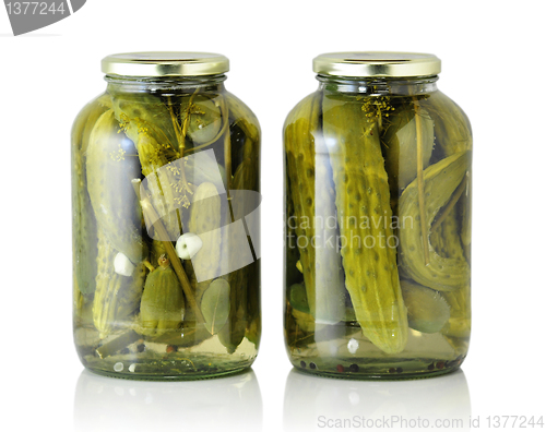 Image of Glass jars with pickled cucumbers 