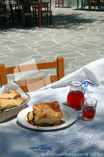 Image of greek taverna meal with wine