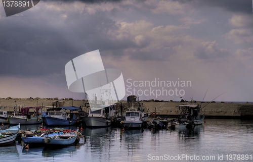 Image of Fishing ships in a harbor